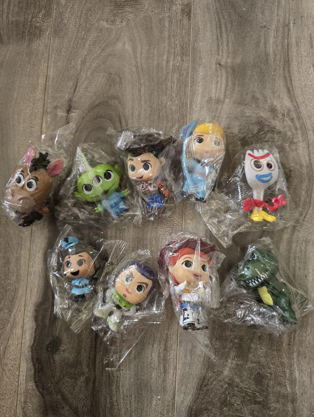 9 TOY STORY FIGURINES
